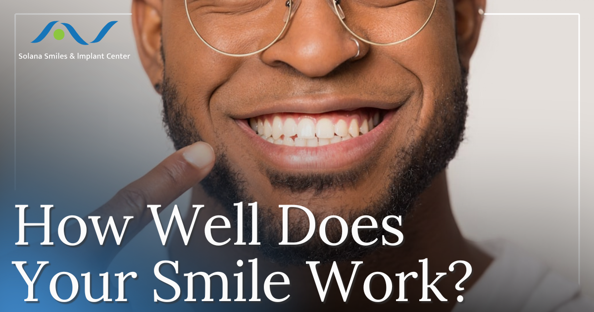 man pointing to his smile