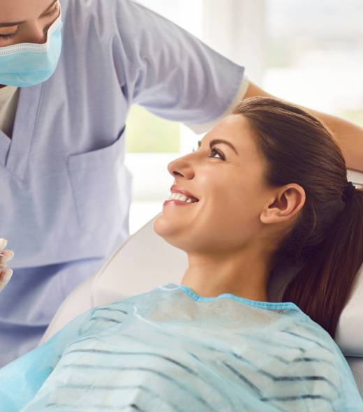 Doctor,Dentist,,Nurse,,Or,Orthodontist,Conducting,A,Dental,Examination,For